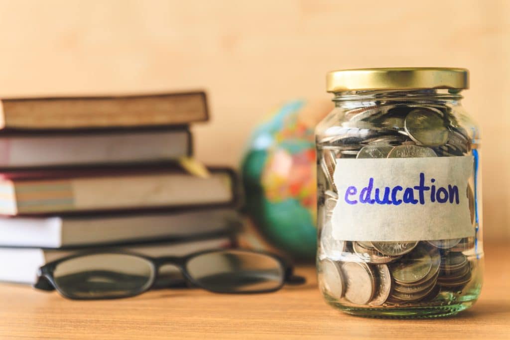piggy bank to save for education costs